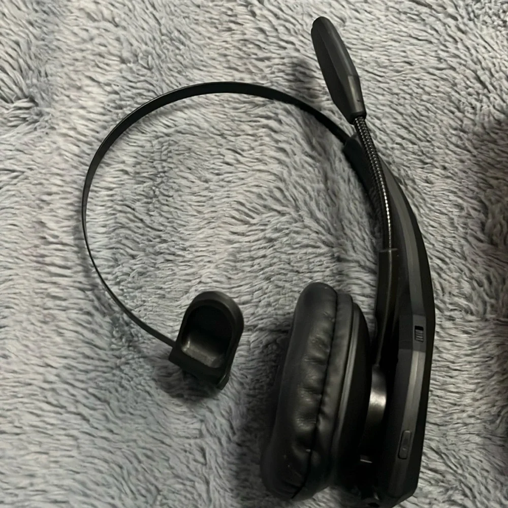 Wireless Bluetooth headset with microphone.